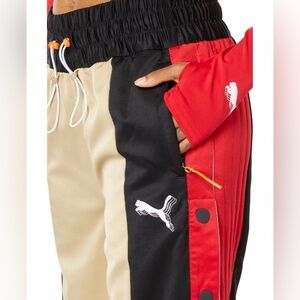 Puma June Ambrose XSmall Diggins Breakaway Track Pants NBA Hoops Red Black Gold